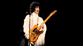 Prince performs with his Telecaster