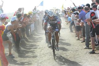 Fabian Cancellara drills it on the front, pulling Andy Schleck away from his competitors.
