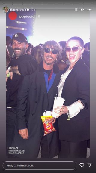From left to right: Gabriele Gabar, Pierpaolo Piccioli and Florence Pugh at Beyoncé's concert.