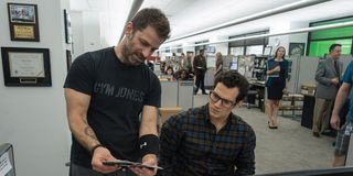 Zack Snyder working with Henry Cavill on the set of Batman v Superman