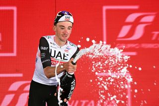 BERGAMO ITALY MAY 21 Brandon Mcnulty of The United States and UAE Team Emirates celebrates at podium as stage winner during the 106th Giro dItalia 2023 Stage 15 a 195km stage from Seregno to Bergamo UCIWT on May 21 2023 in Bergamo Italy Photo by Stuart FranklinGetty Images
