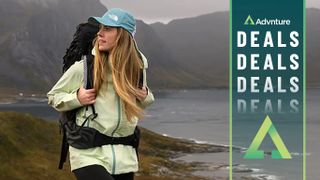 Woman hiking wearing The North Face gear