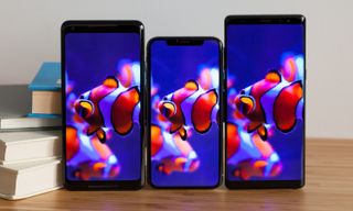 The iPhone X (center) took on all comers with its OLED screen last fall, but the Galaxy S9 will be a real challenger.