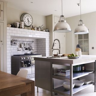industrial style kitchen with stainless steel island