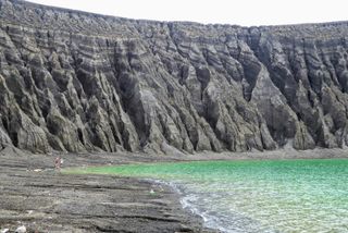 The cliffs of a crater lake on the new island of Hunga Tonga-Hunga Ha’apai look otherworldly in this image by NASA scientist Dan Slayback during a visit to the nascent island with Woods Hole’s Sea Education Association (SEA) Semester’s South Pacific cruise in 2018.