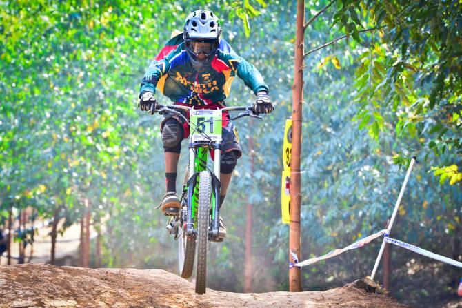 Theo Ngubane flies through one of the sections on the Cascades MTB Park's downhill course as he became the first black South African to take part in the Downhill at World Championships when he competed in the Junior Men's Downhill finals in Pietermaritzburg on Friday.