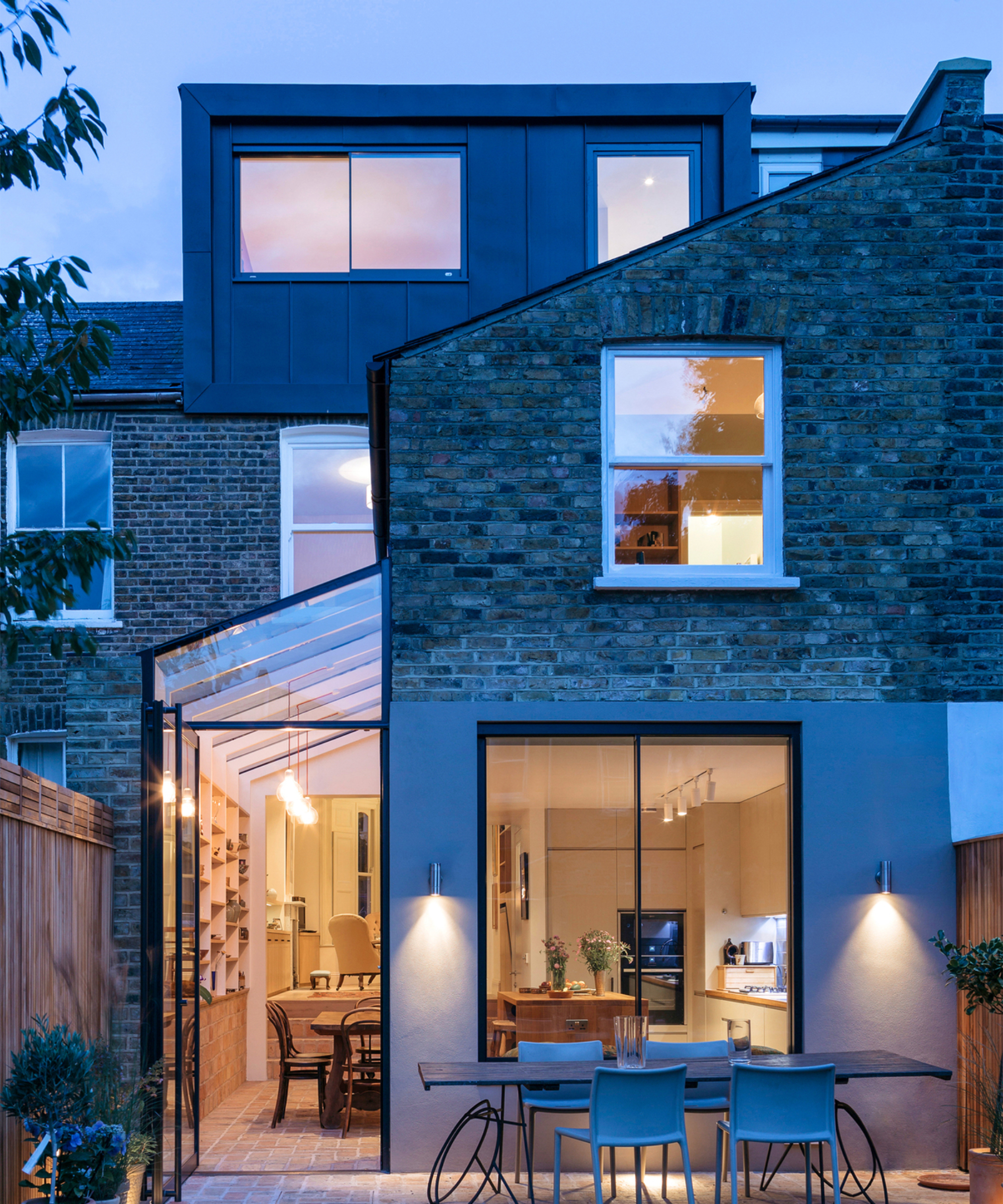 zinc clad dormer loft conversion on terraced home with rear and side extension