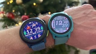 Coros Pace Pro and Coros Pace 3 on a person's wrist with Christmas themed watch faces