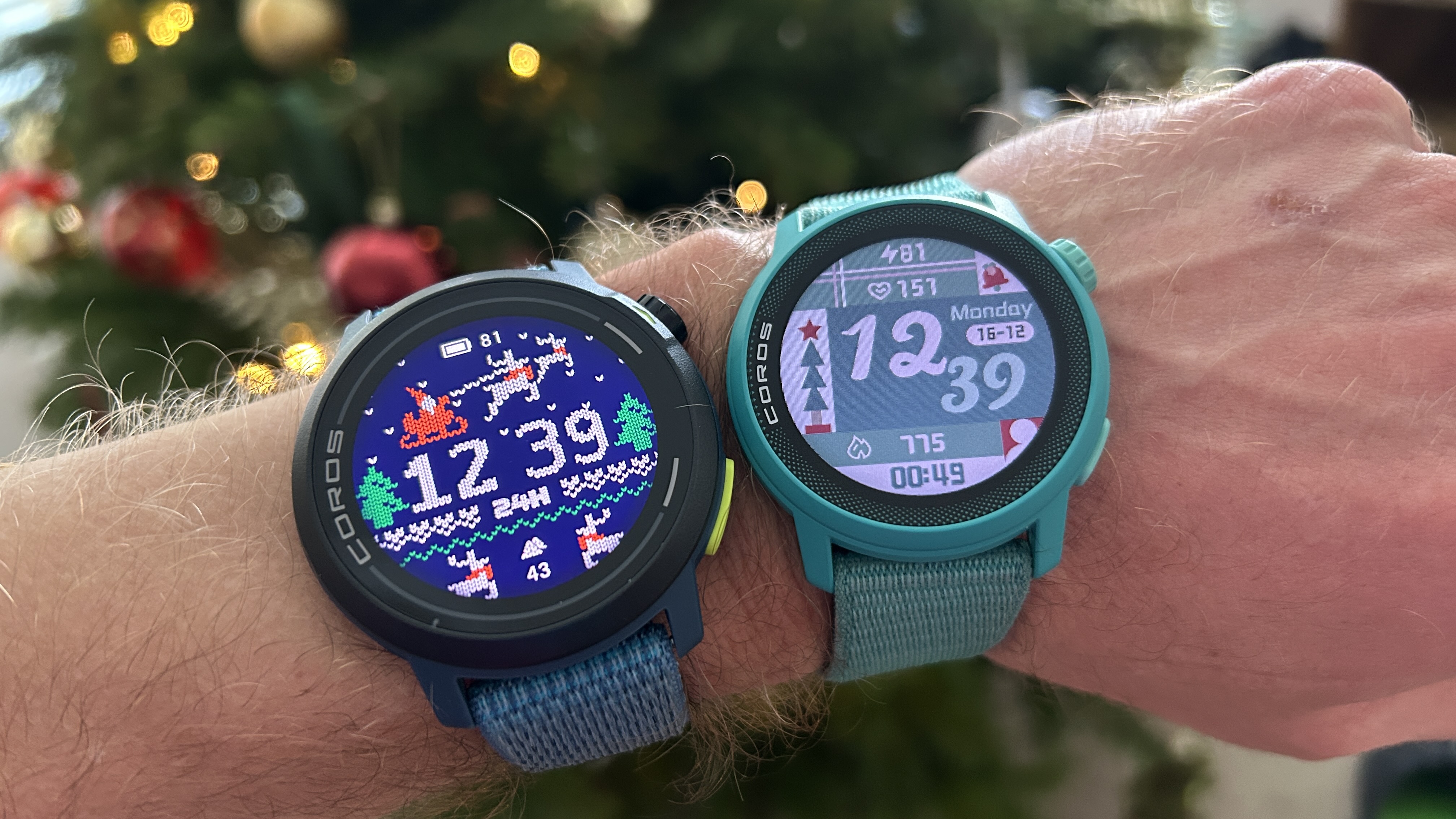 Coros Pace Pro and Coros pace 3 on a person's wrist with Christmas themed watch ⁣faces