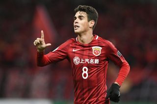 Oscar celebrates after scoring a goal for Shanghai SIPG vs Sukhothai in February 2017.