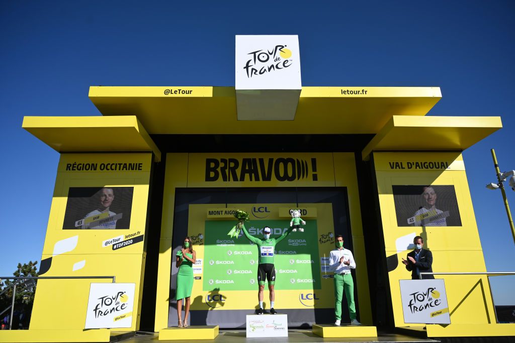 GARD FRANCE SEPTEMBER 03 Podium Sam Bennett of Ireland and Team Deceuninck QuickStep Green Points Jersey Celebration Mascot Flowers Mask Covid safety measures Landscape during the 107th Tour de France 2020 Stage 6 a 191km stage from Le Teil to Mont AigoualGard 1560m TDF2020 LeTour on September 03 2020 in Gard France Photo by Stuart FranklinGetty Images