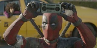 Deadpool with a tiny boombox