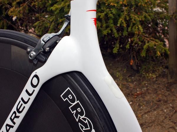 The seat stay wishbone is intentionally broad, apparently to help divert air around the brake caliper. Mechanics need a very long Allen wrench to access the rear brake mounting bolt.