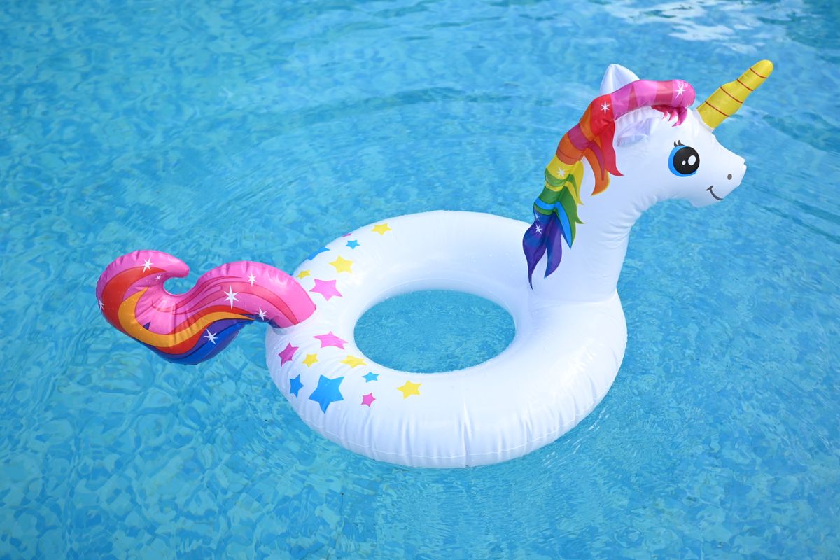 An inflatable unicorn in a swimming pool