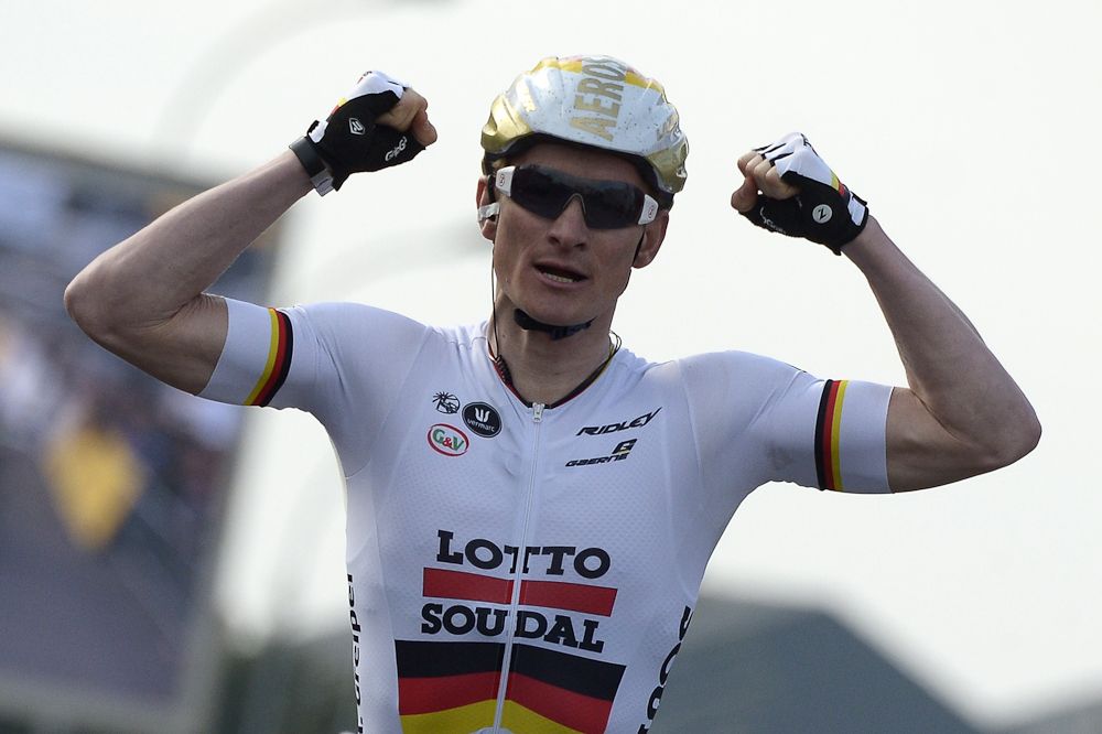 Germany's Andre Greipel celebrates as he crosses the finish line at the end of the second stage of Paris-Nice.