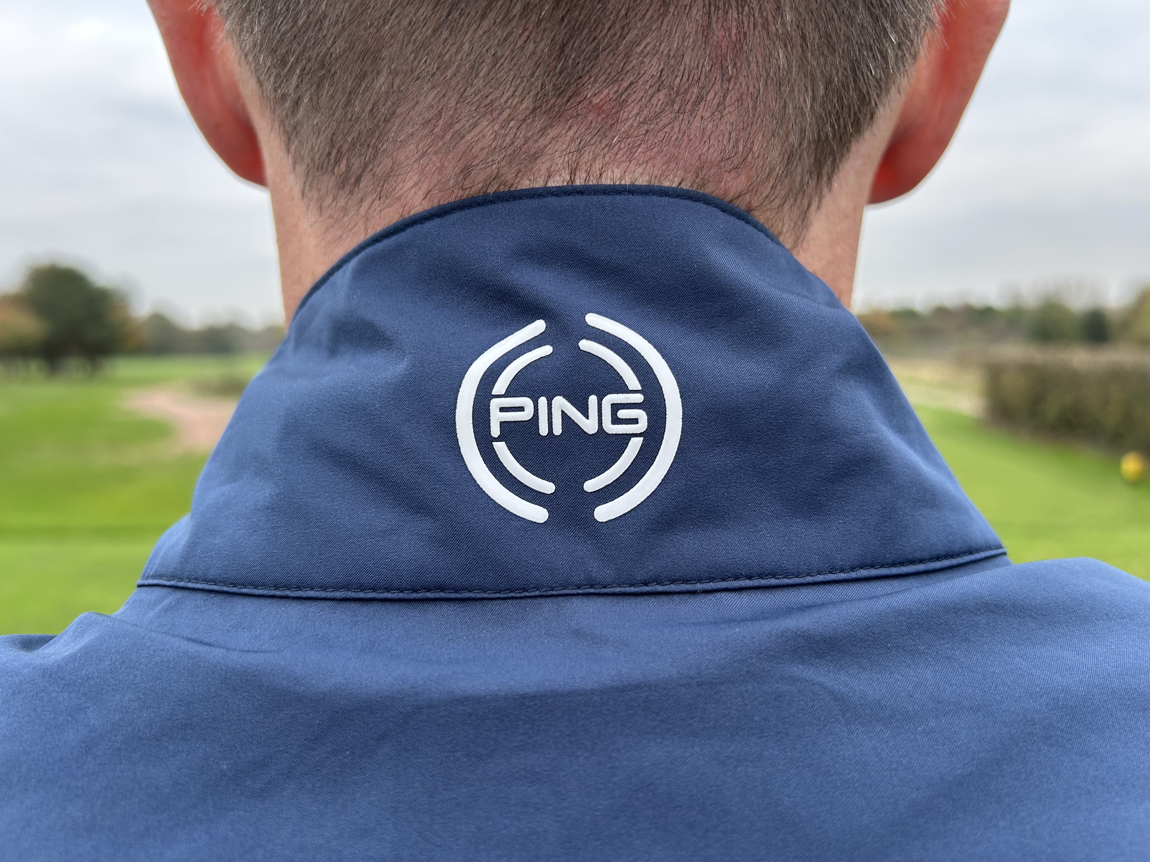 Ping SensorDry AquaDrive waterproof jacket logo on rear neck collar