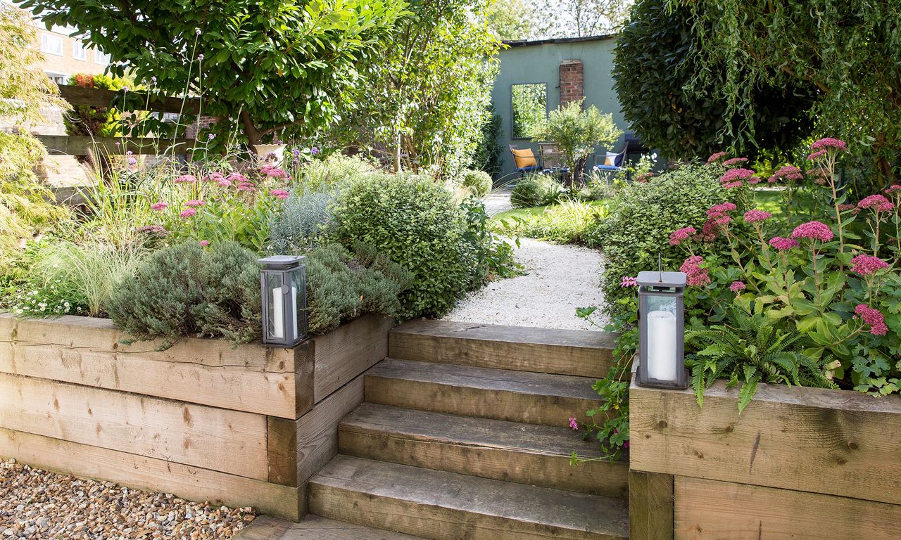 garden with trees and flower plants