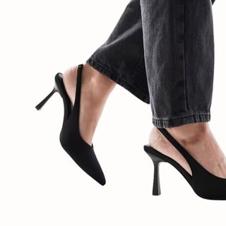 flat lay image of black heels