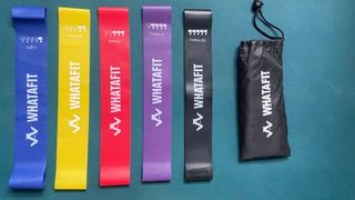 Whatafit Resistance Bands laid out on a table