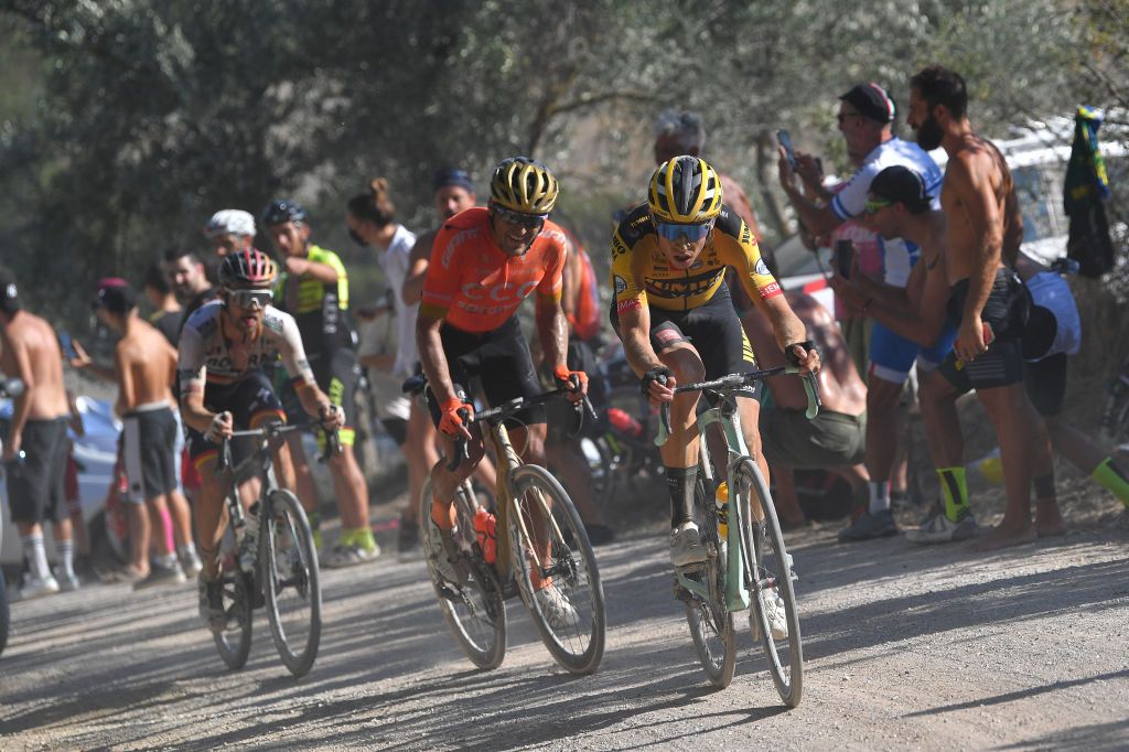 SIENA ITALY AUGUST 01 Wout van Aert of Belgium and Team JumboVisma Greg Van Avermaet of Belgium and CCC Team Maximilian Schachmann of Germany and Team BoraHansgrohe Dust Gravel Strokes during the Eroica 14th Strade Bianche 2020 Men a 184km race from Siena to SienaPiazza del Campo StradeBianche on August 01 2020 in Siena Italy Photo by Tim de WaeleGetty Images