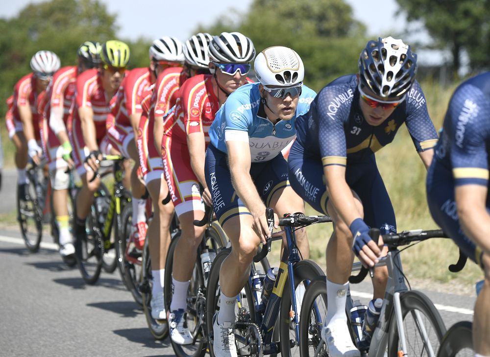 An Aqua Blue Sport rider at the head of the Denmark peloton