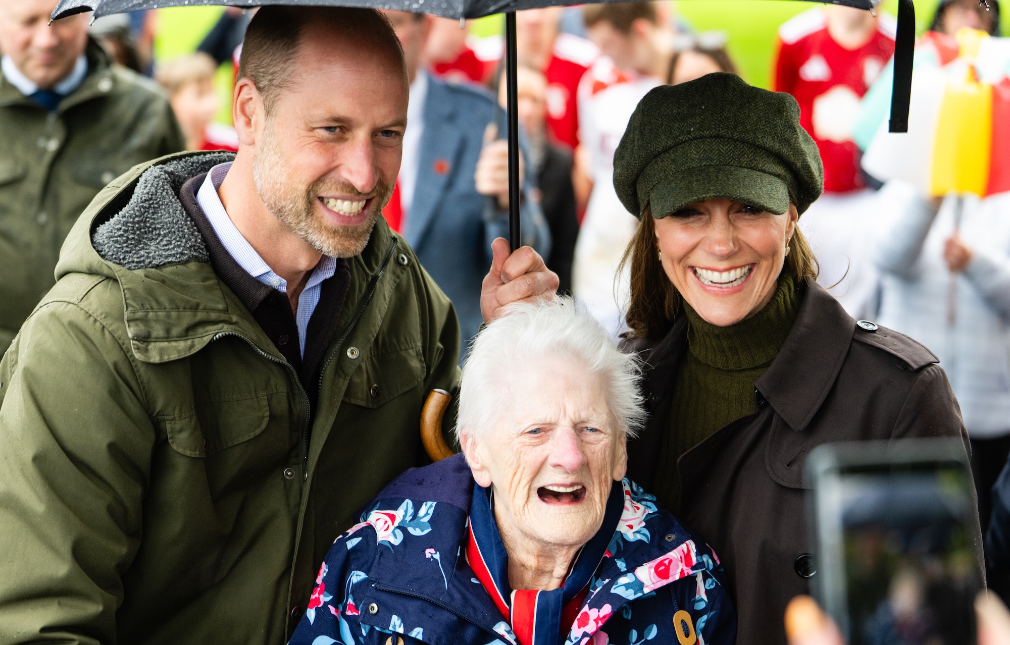 Prince William, Prince of Wales, and Catherine, Princess of Wales, pose with 95-year-old Jenny Salli September 17, 2026 in Rothesay, Isle of Bute, Scotland. (Photo by Samir Hussein/WireImage)