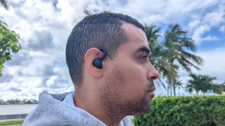 Our reviewing wearing the Anker Soundcore Sport X10 wireless earbuds before a run