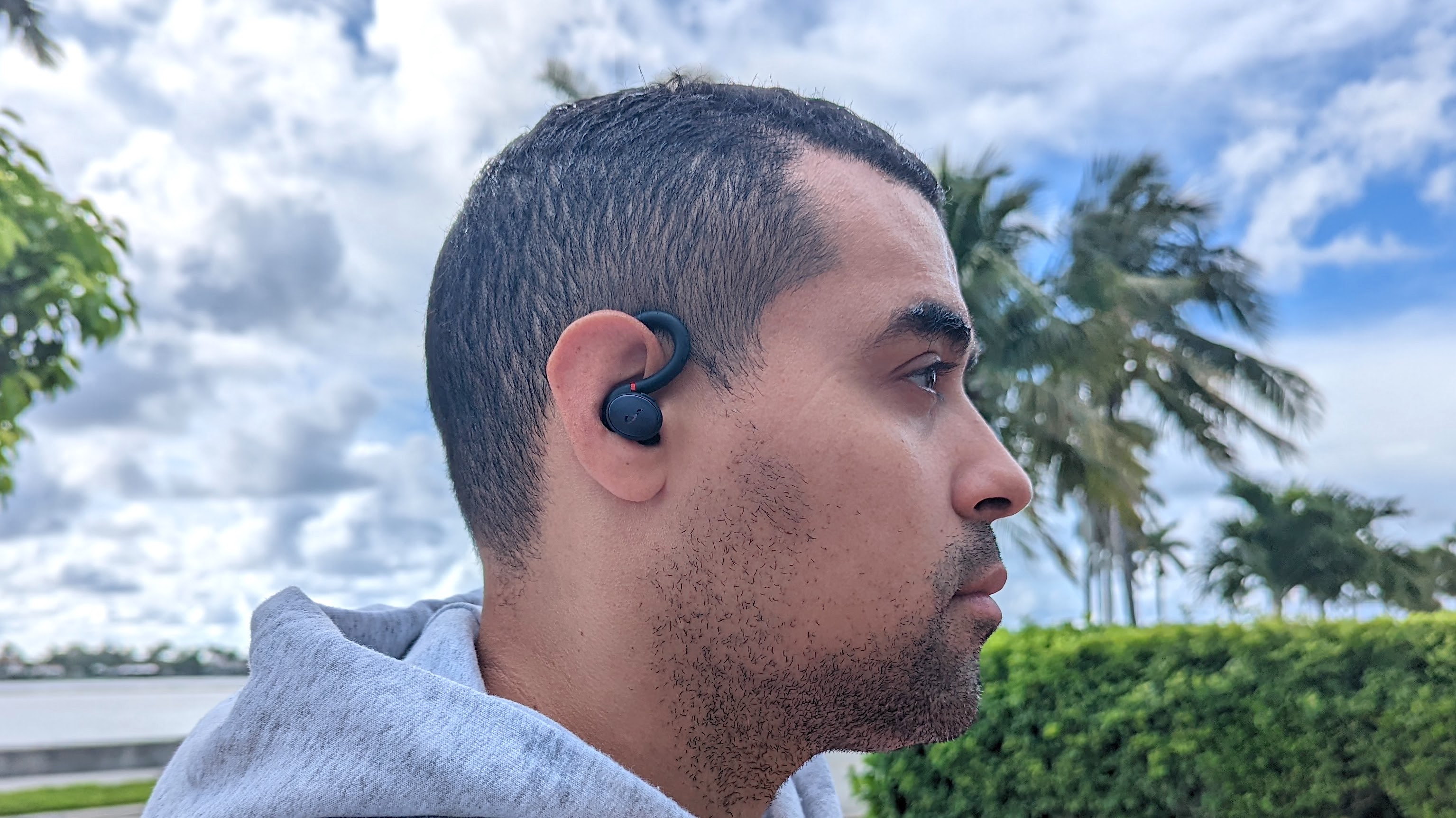 Our reviewing wearing the Anker Soundcore Sport X10 wireless earbuds before a run
