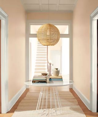 peach hallway with white woodwork