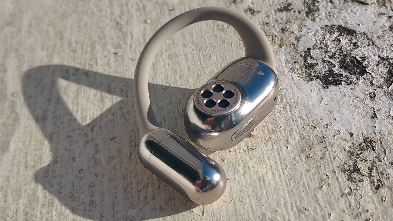 The Xiaomi OpenWear Stereo Pro in a sunny outdoor setting.