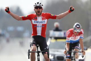 Kasper Asgreen (Elegant-Quickstep) took an upset victory over defending champion Mathieu van der Poel (Alpecin-Fenix) in the 2021 Tour of Flanders