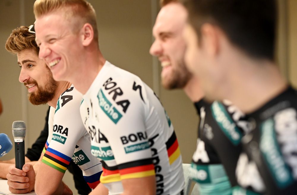 The Bora-Hansgrohe riders enjoy one of Peter Sagan's jokes