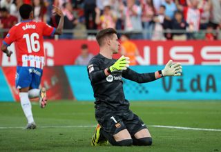Barcelona goalkeeper Marc-Andre ter Stegen reacts in frustration after conceding a goal to Girona in LaLiga in May 2024.