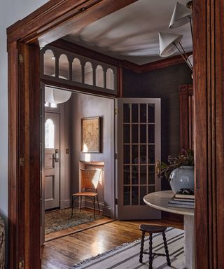 open entryway of a traditional home with wooden details