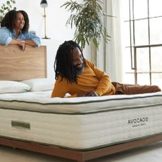 A couple enjoying their new Avocado mattress