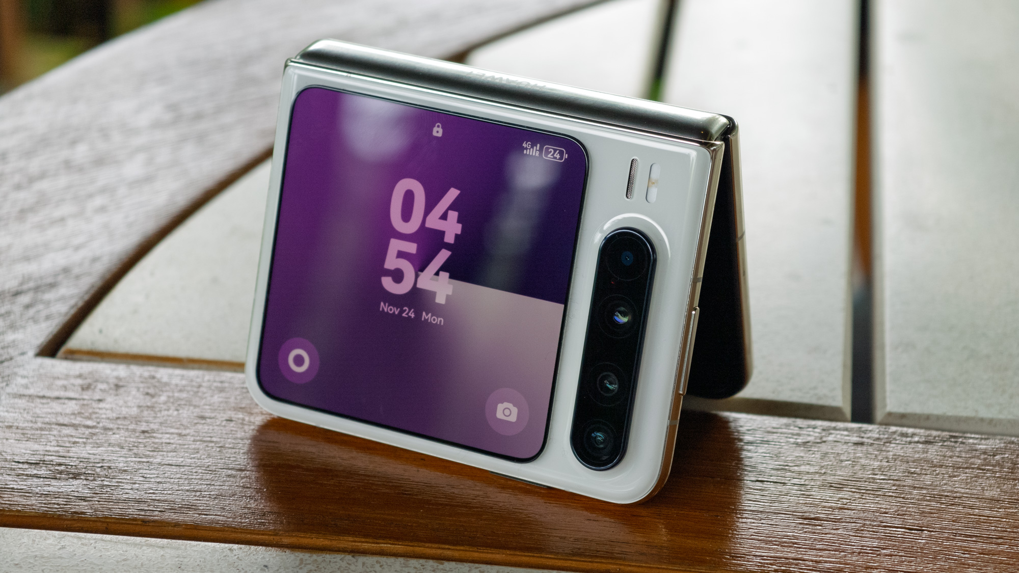 Huawei Pura X in White in landscape on a table