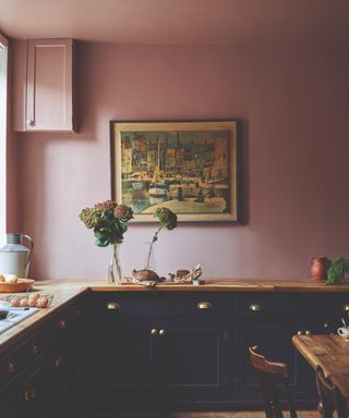 Pink and black kitchen