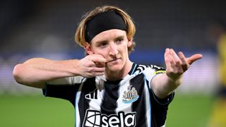 Anthony Gordon of Newcastle United celebrates scoring his team's third goal from the penalty spot during the UEFA Champions League 2025/26 League Phase MD2 match between R. Union Saint-Gilloise and Newcastle United FC at RSC Anderlecht Stadium on October 01, 2025 in Brussels, Belgium. 