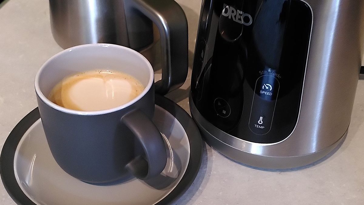Dreo BaristaMaker machine beside oat milk latte