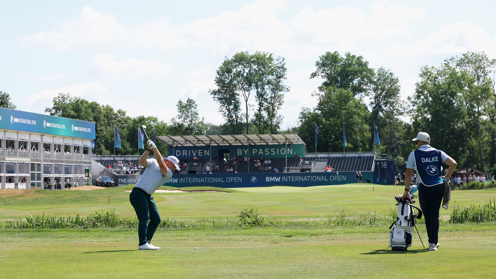 Brad Dalke hits into the 18th green at the BMW International Open