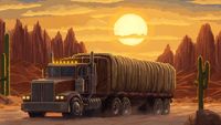 A large truck in the desert during sunset