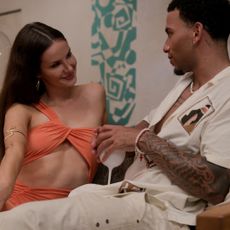 sandy and louis talk together while sitting on a couch in perfect match season 3