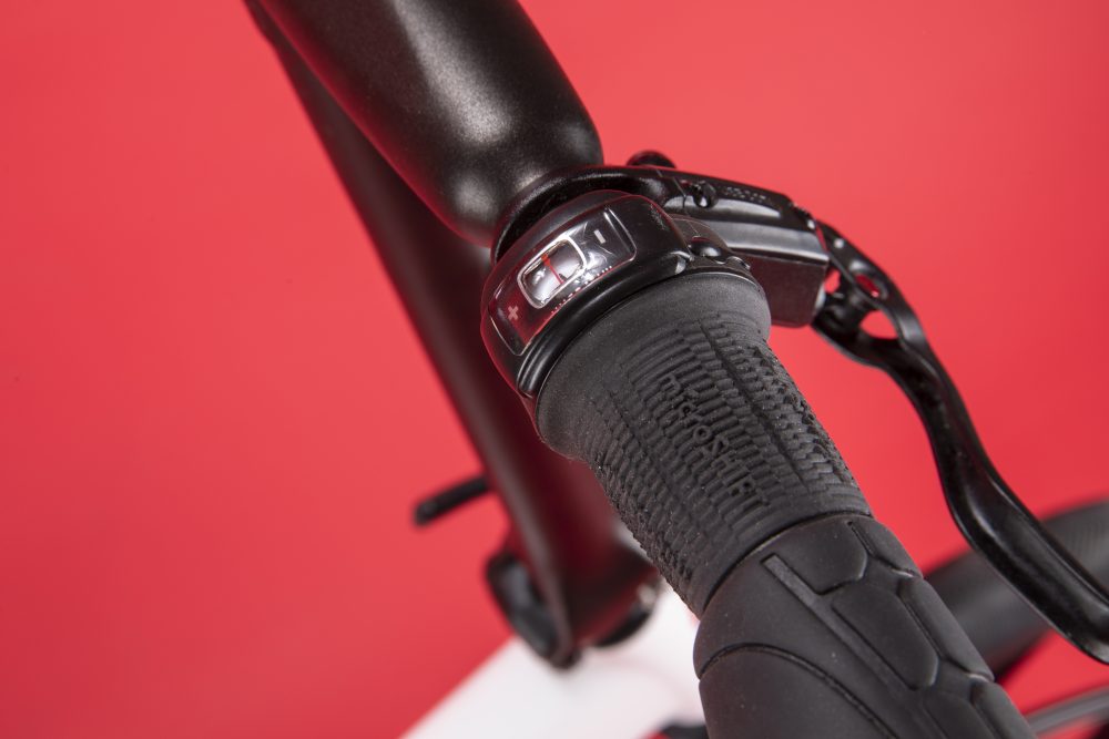 Hydraulic brakes take care of stopping while a Microshift gripshift provides slick gear changes.
