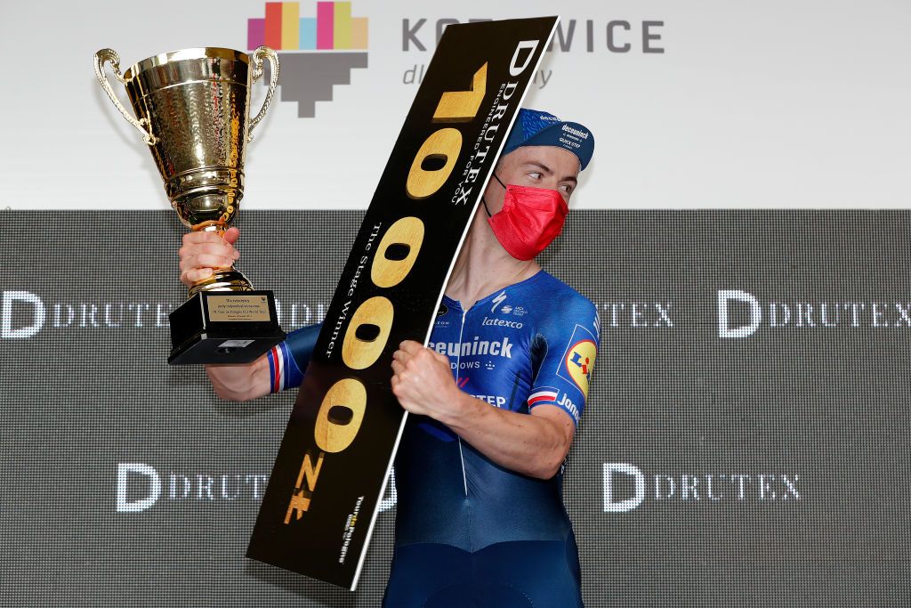 KATOWICE POLAND AUGUST 14 Rmi Cavagna of France and Team Deceuninck QuickStep celebrates winning the stage on the podium ceremony after the 78th Tour de Pologne 2021 Stage 6 a 19km Individual Time Trial stage from Katowice to Katowice TourdePologne TDP2021 UCIWT on August 14 2021 in Katowice Poland Photo by Bas CzerwinskiGetty Images