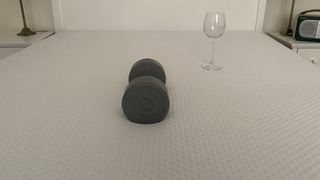 Emma Premium mattress drop test with weight and wine glass