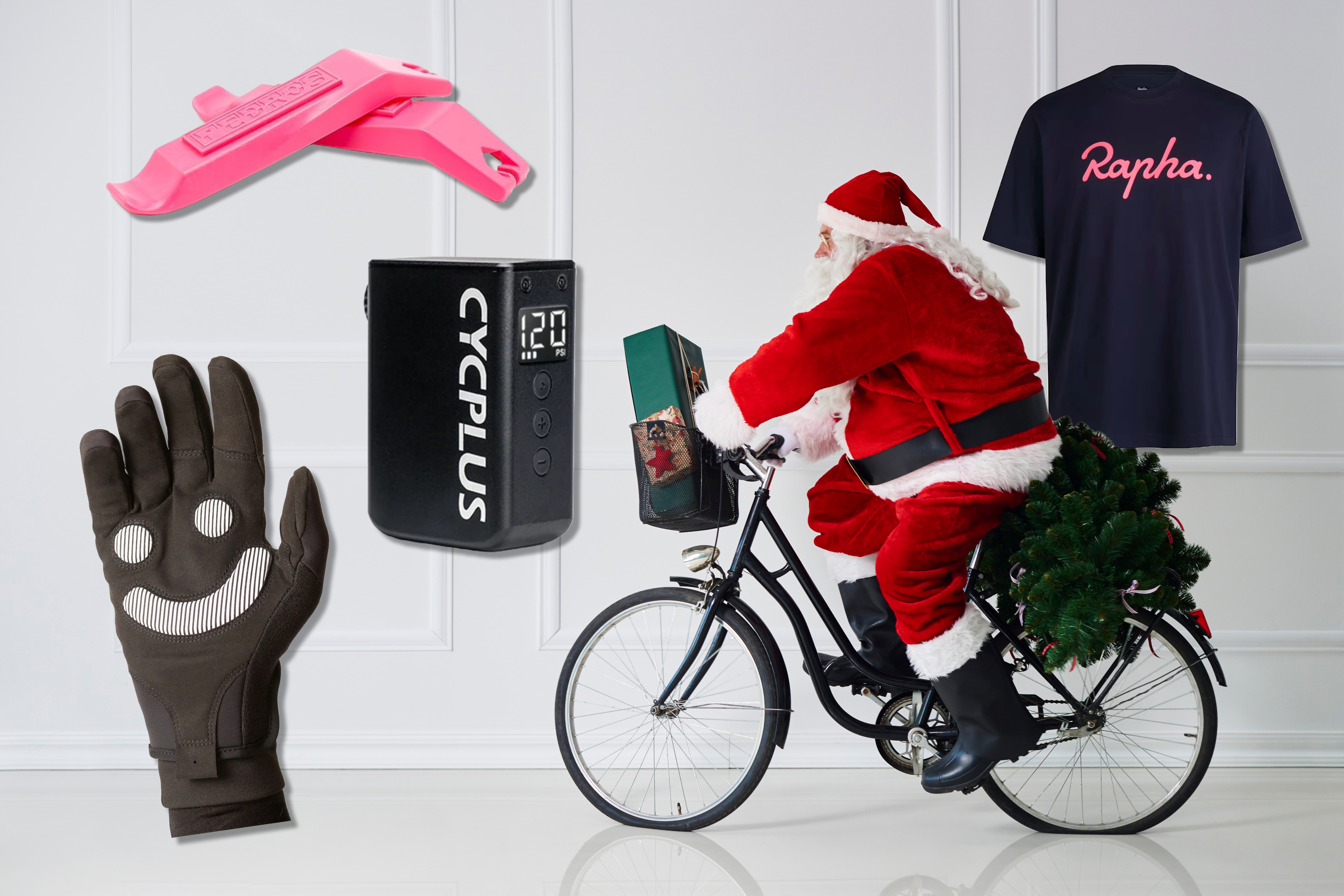 Santa riding on a bike with a collage of iteams surrounding him: a Rapha t-shirt, Cycplus pump, Loffi glove and pink Pedro&#039;s tyre levers