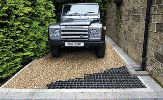 Use a grid from Marshalls to secure gravel drives