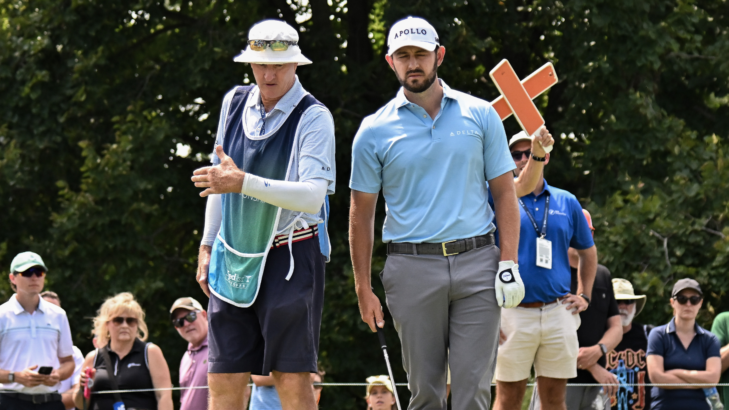 Patrick Cantlay with his caddie