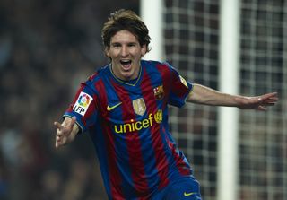 Lionel Messi celebrates after scoring for Barcelona against Valencia at Camp Nou in 2010.