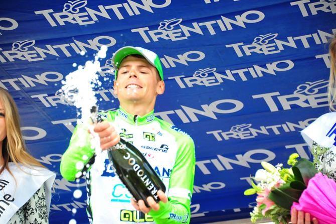 Edoardo Zardini (Bardiani-CSF) opens a bottle of champaign in celebration of his Stage 2 victory